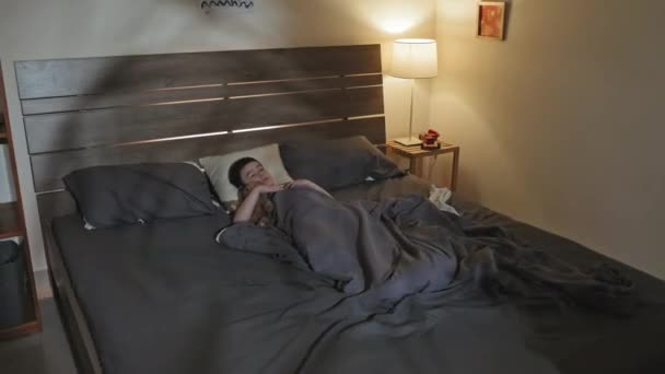 Little Boy Sleeping Bed Toy Room Lighted Side Lamp Night — Vídeo de Stock