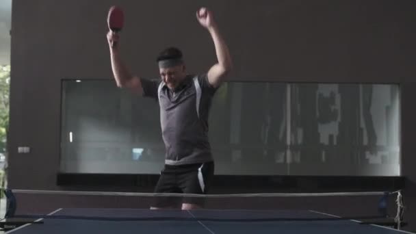 Excited Table Tennis Player Holding Racket Smiling Jumping While Celebrating — Stockvideo