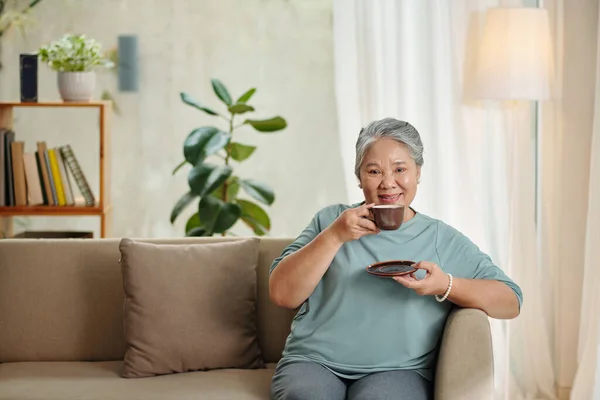 Portrait Happy Aged Woman Drining Cup Coffee Watching Movie — Fotografia de Stock