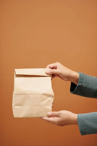 Woman Giving Paper Package Food Local Cafe — Stok fotoğraf