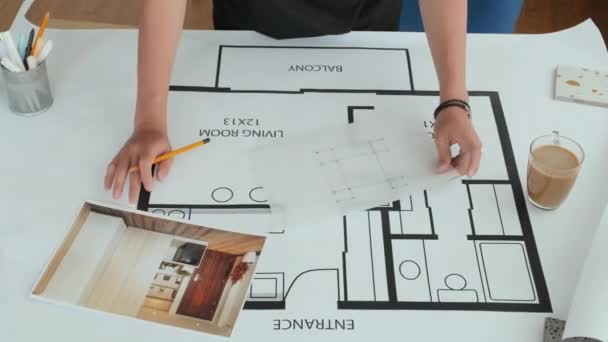 View Male Interior Designer Using Tracing Paper Pencil While Working — 图库视频影像