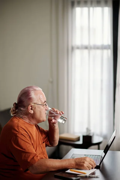 Senior Man Drinking Glass Water Fishing Working Laptop — Photo
