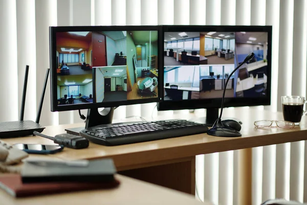 Desk with monitors in office of security guard