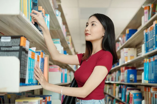College Student Searching Books Her Research Library — Stok fotoğraf