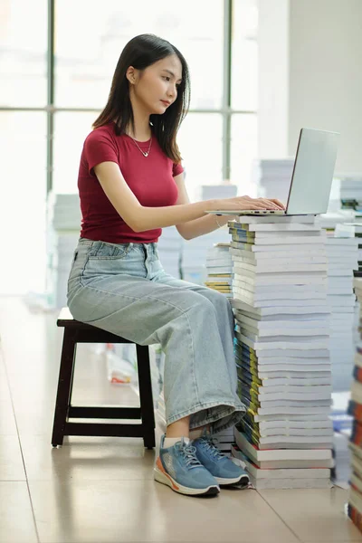 Girl Putting Laptop Stack Books Working School Project — Stock fotografie
