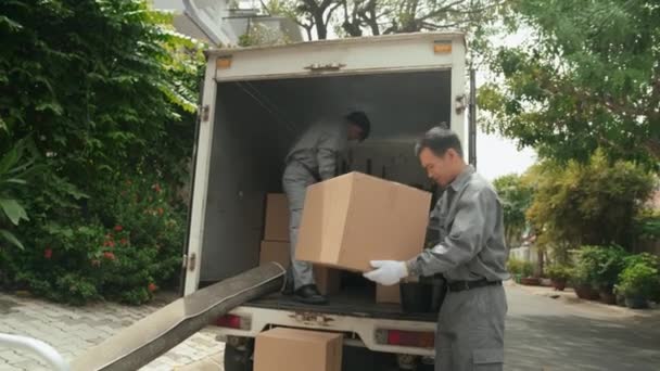 Full Shot Two Asian Men Workwear Gloves Unloading Boxes Truck — Stock Video