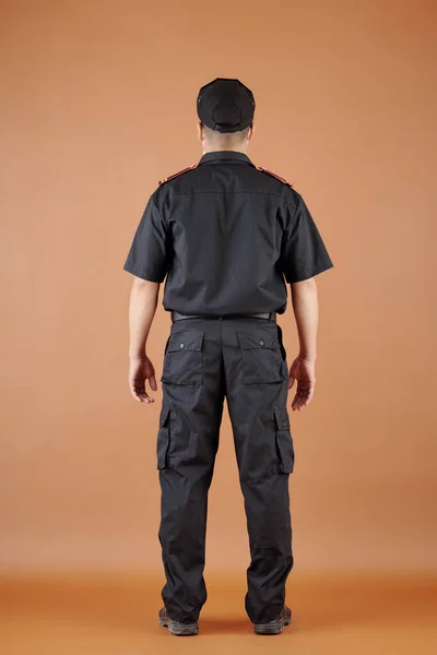 Důvěryhodný Strážce Černé Uniformě Pohled Zezadu — Stock fotografie