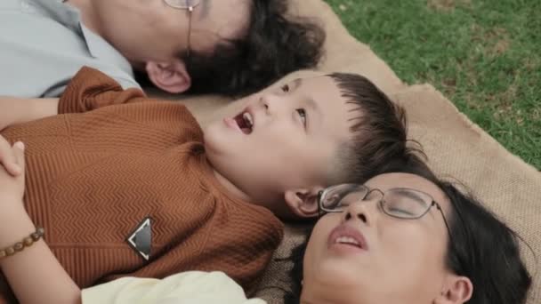 High Angle Shot Happy Asian Parents Little Son Lying Together — Stock Video
