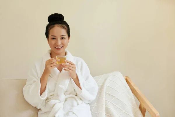 Portrait Smiling Young Vietnamese Woman Bathrobe Holding Cup Herbal Tea — Stock Photo, Image