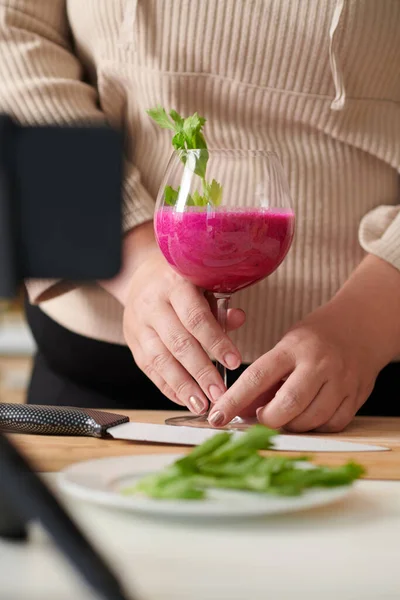 Hands Woman Putting Glass Delicious Red Smoothie Arugula She Made — Stock Photo, Image