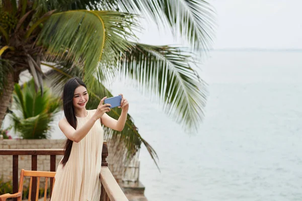 Happy Young Woman Flowing Dress Photographing Seascape Her Social Media — Stock Photo, Image