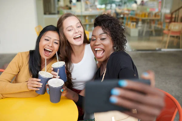 Joyful Laughing Young Women Taking Photos Smartphone Sitting Cafe Table — Stock Photo, Image