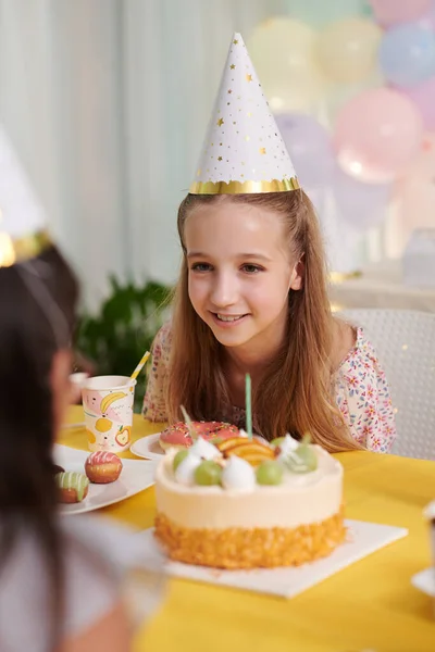Smiling Preteen Girl Talking Friend Birthday Party — Stock Photo, Image