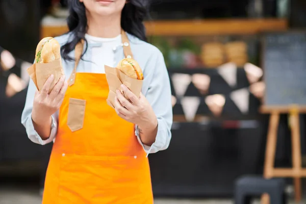 Cropped Image Food Truck Worker Holding Two Sandwiches Ham Fresh — Stock Photo, Image