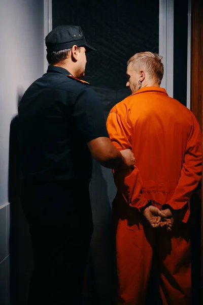 Jail Officer Walking Criminal Orange Uniform Ward — Stock Photo, Image