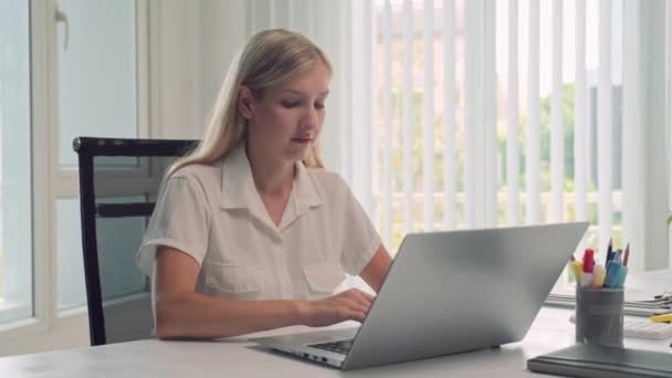 Portrait Young Businesswoman Working Laptop While Sitting Office Desk Looking — Stock Video