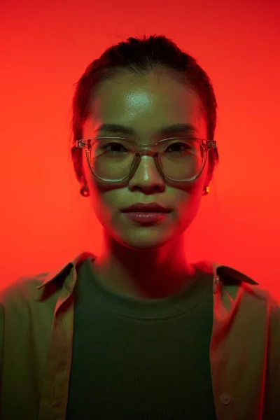 Portrait Young Asian Woman Glasses Standing Red Light — Stock Photo, Image