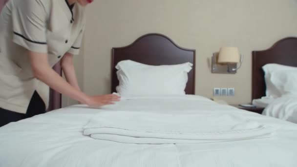 Medium Long Shot Young Maid Changing White Linen Bed Room — Stock Video