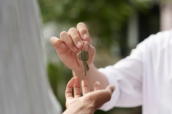 Closeup Image Estate Agent Giving Keys New House Owners — Stock Photo, Image