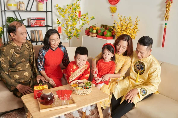 Family Drinking Tea Various Treats Celebrating Tet Home — Stock Photo, Image