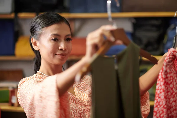 Smiling Young Vietnamese Woman Choosing Dress Clothing Department — Stock Photo, Image