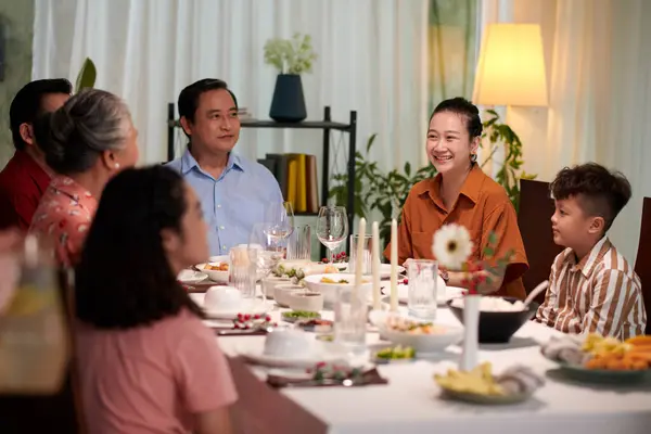 Happy Vietnamese Married Couple Attending Family Dinner — Stock Photo, Image