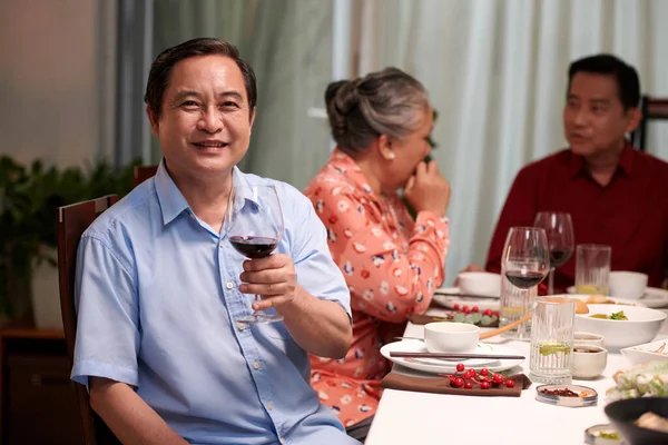 Smiling Senior Vietnamese Man Drinking Wine Family Celebration — Stock Photo, Image