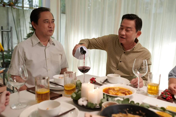 Vietnamese Men Drinking Wine Sharing Stories Dinner Party — Stock Photo, Image