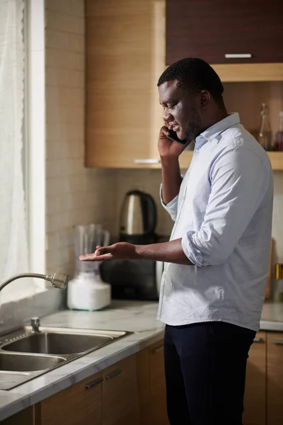 Black Man Calling Landlord Tell Leaking Kitchen Tap — Stock Photo, Image