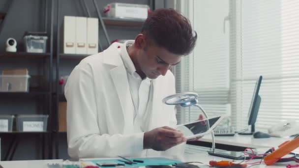 Medium Shot Busy Man White Labcoat Examining Broken Digital Tablet — Stock Video