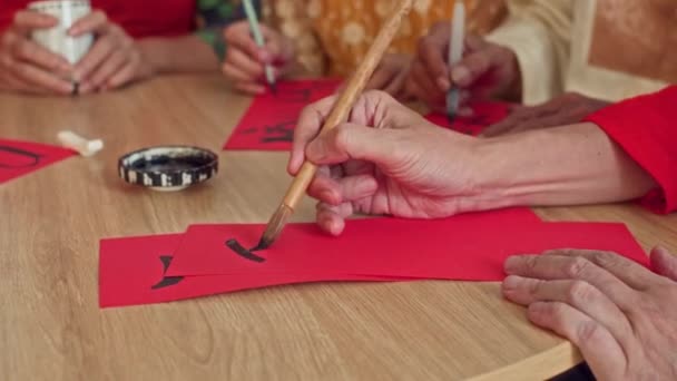 Close Hands Vietnamese People Using Black Ink While Writing Calligraphy — Stock Video