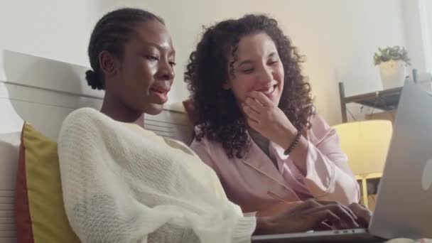 Medium Shot Diverse Girlfriends Pajamas Watching Funny Film Wireless Laptop — Stock Video