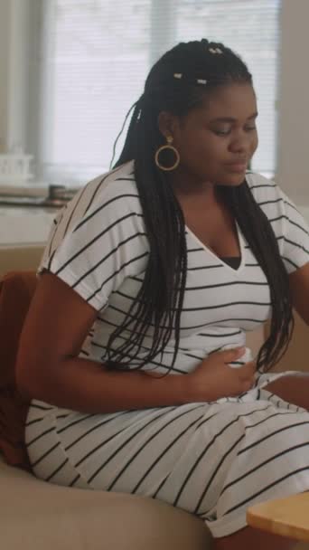 Vertical Shot Black Expecting Mom Dress Drinking Tea Sitting Sofa — Stock Video