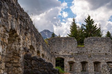 Natural stone walls of the ruins of Fort Claudia in the mountains overlooking Mount Thaneller, Reutte, Austria. Fort Claudia is part of the Ehrenberg Castle Ensemble