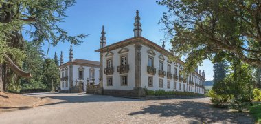 Vila Real / Portugal - 08 01 2020: Panoramic view at the front facade building at the Mateus Palace or Solar de Mateus, a touristic and iconic 18th century Portuguese baroque building