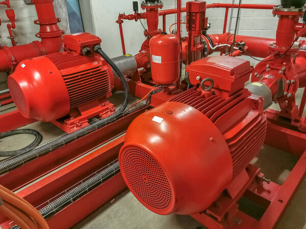 View at industrial electrically powered water pumps and pipes, this pumping group serves for water injection for building fires, sprinklers and fire reels View industrial electrically powered pump