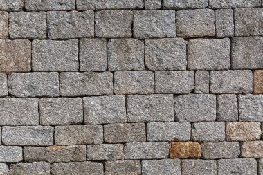 Mimari dokular, kalenin duvarlarında kullanılan geleneksel bir granit duvarın detaylı görüntüsü....