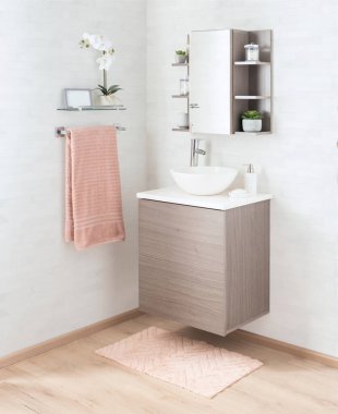 Bright bathroom interior with a white countertop washbasin, bathroom sink, mirror, and towels hanging on a rack, wooden floor clipart