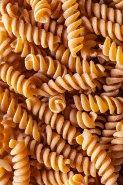 İtalyan toptan makarnası ile arka plan. Fusilli.