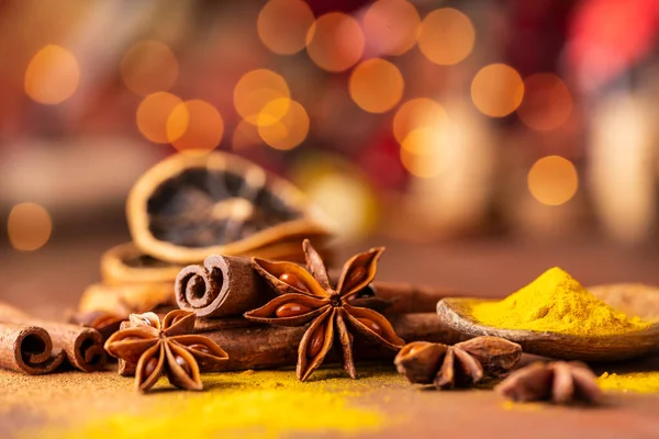 Various Spices Dried Orange Slices Lights Bokeh Background Still Life — Stock Photo, Image