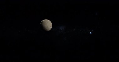 Cüce Gezegen 28978 Ixion 'a doğru. Arka planda Neptün gezegeni var.