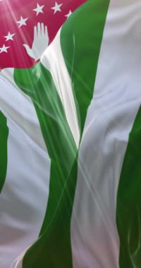 Abhazya bayrağı rüzgarda dalgalanıyor. 4K Dikey