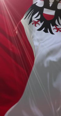 Almanya 'nın kuzeyinde Schleswig-Holstein eyâletinde Lbeck bayrağı. Döngü. 4K Dikey