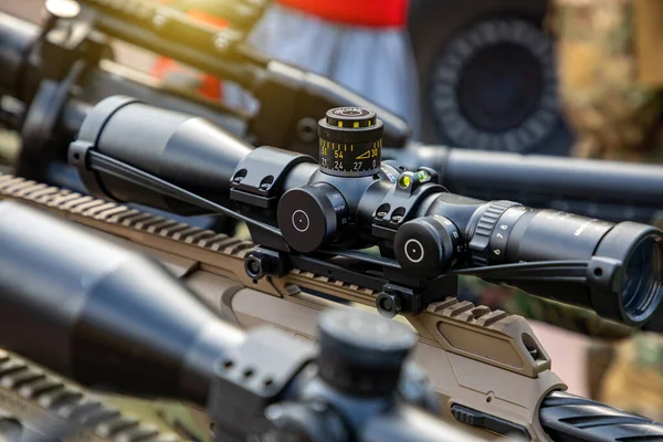 stock image Optical sight on a sniper gun. War in Ukraine.