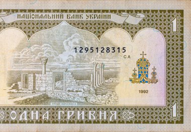 Ukrayna 1 Hryvnia banknotunun bir parçası ve Chersonese harabeleri. Ukrayna 'nın kağıt parası.