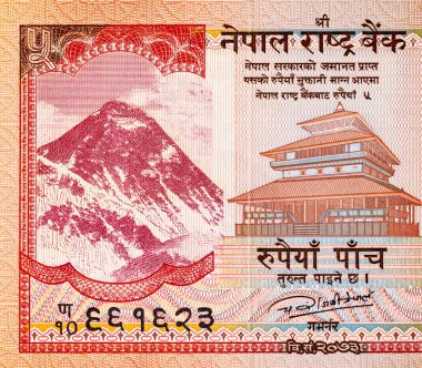 Üzerinde Everest Dağı 'nın resmi olan 5 rupilik Nepal banknotu, tasarım için. Nepal parası