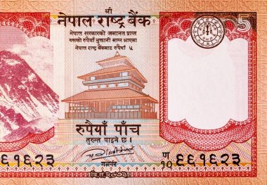Üzerinde Everest Dağı 'nın resmi olan 5 rupilik Nepal banknotu, tasarım için. Nepal parası