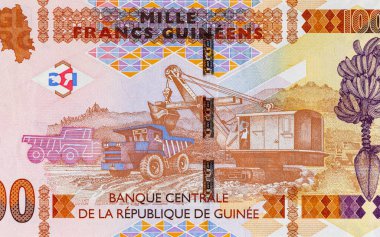 Açık çukur yöntemiyle Bauxite madenciliği imajı verilmiş 1000 gine frangı. Afrika Gine parası. Yakın plan..