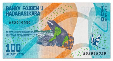 100 Ariary Madagaskar, Mantella baronisi kurbağası resmi olan banknotun bir parçası. Madagaskar 'ın parası..