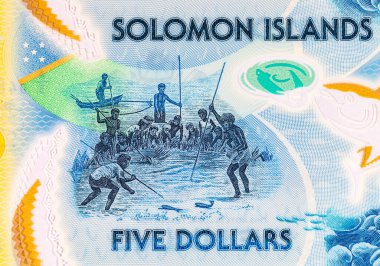 Solomon Adaları 5 Dolar. Polimer banknot, sualtında balık tutan bir adam resmi. Solomon Adalarının Parası.